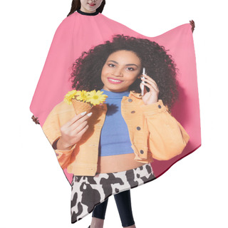 Personality  Happy African American Woman Talking On Smartphone And Holding Waffle Cone With Flowers On Pink  Hair Cutting Cape
