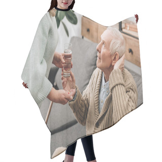 Personality  Senior Woman Helping To Old Man With Walking Stick And Giving Pills  Hair Cutting Cape