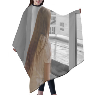 Personality  Sad Teenager Girl Looking The Rain Falling Through A Window At Home Or Hotel. Hair Cutting Cape