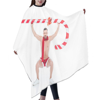 Personality  Shirtless Muscular Man In Santa Shorts And Red Scarf Exercising With Big Striped Christmas Stick Isolated On White Background Hair Cutting Cape