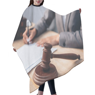 Personality  Cropped View Of Judge Signing Insurance Policy Document Near Gavel  Hair Cutting Cape