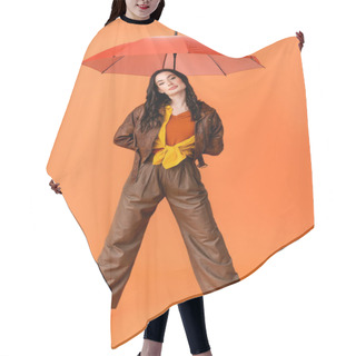 Personality  Full Length Of Young Fashionable Woman In Autumn Outfit And Boots Standing With Umbrella On Orange Hair Cutting Cape