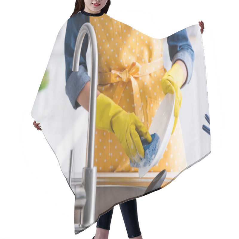 Personality  Cropped view of housewife washing plate in kitchen hair cutting cape