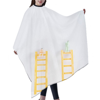 Personality  Two People Figures On Ladders On White Surface On Grey Background With Copy Space, Concept Of Equality Rights  Hair Cutting Cape