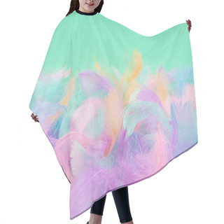 Personality  Colorful Feather On Mint Background, Top View.  Hair Cutting Cape