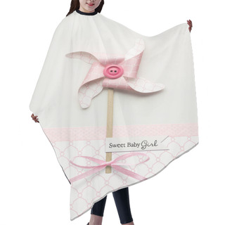 Personality  Creative Concept Photo Of A Wind Mill Made Of Paper On Grey Pink Background. Hair Cutting Cape