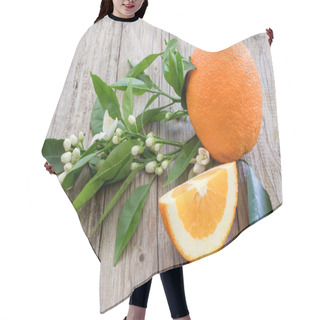 Personality  Orange On A Wooden Board. Hair Cutting Cape