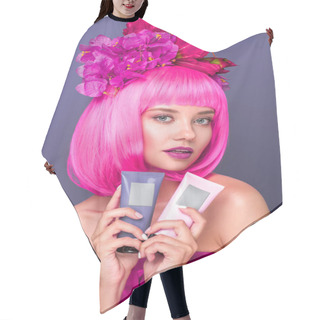 Personality  Beautiful Young Woman With Pink Bob Cut And Flowers In Hair Holding Tubes Of Coloring Hair Tonics Isolated On Violet Hair Cutting Cape