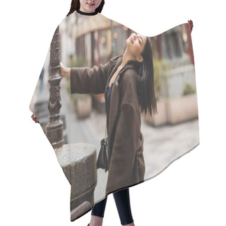 Personality  Sensual Brunette Woman In Brown Autumn Coat Posing Near Lamppost In Prague Hair Cutting Cape