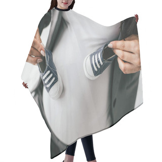 Personality  Cropped View Of Pregnant Woman Holding Small Baby Bootees Hair Cutting Cape