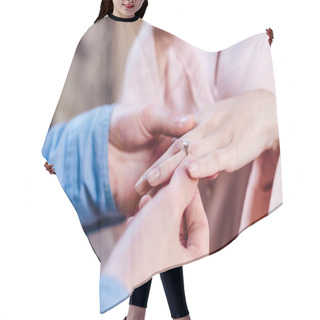 Personality  Cropped View Of Man Putting Wedding Ring On Finger Of Girlfriend  Hair Cutting Cape