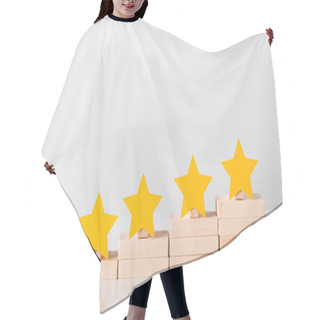 Personality  Yellow Stars On Wooden Cubes Isolated On White  Hair Cutting Cape