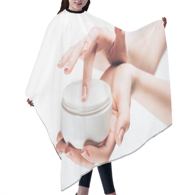 Personality  cropped shot of woman taking moisturizing cream from jar isolated on white hair cutting cape