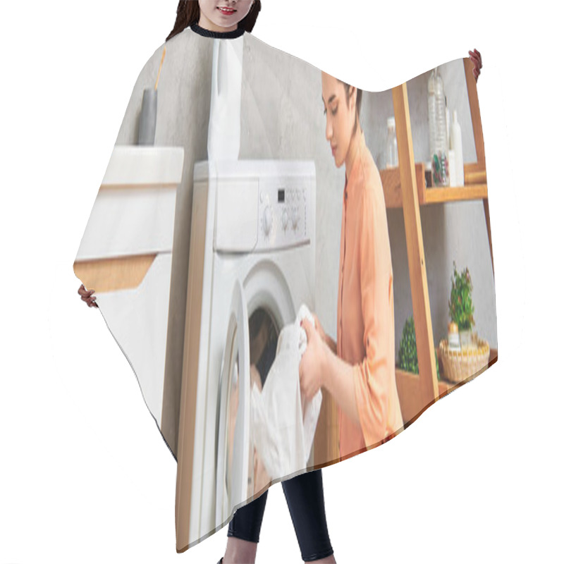 Personality  A stylish woman in casual clothing gracefully places a cloth into a humming dryer. hair cutting cape