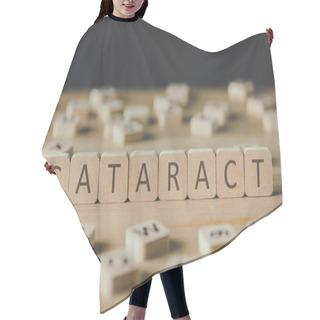 Personality  Selective Focus Of Cataract Lettering On Cubes Surrounded By Blocks With Letters On Wooden Surface Isolated On Black Hair Cutting Cape