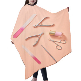 Personality  Top View Of Manicure Instruments And Bottle Of Pink Nail Polish On Coral Background Hair Cutting Cape