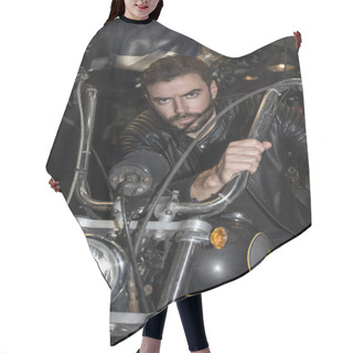 Personality  Biker Fashion Concept. Portrait Of Elegant Young Handsome Man Biker Posing Indoor. Hair Cutting Cape