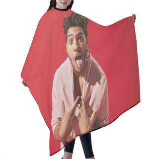 Personality  Funny African American Man Pulling Pink Hoodie And Sticking Out Tongue While On Red Background Hair Cutting Cape