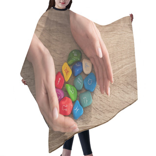 Personality  Cropped View Of Girl Holding Colorful Stones With Zodiac Signs On Wooden Table Hair Cutting Cape