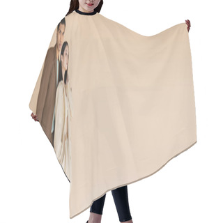Personality  African American Man With Shopping Bags Looking At Camera Near Stylish Asian Woman With Hand In Pocket Isolated On Beige, Banner Hair Cutting Cape
