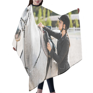 Personality  Attractive Female Equestrian Fixing Horse Saddle At Horse Club Hair Cutting Cape