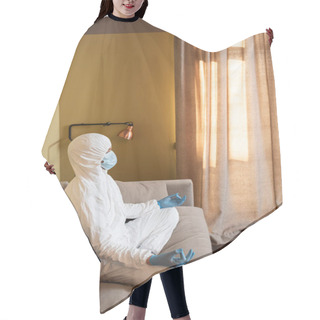 Personality  Side View Of Man In Hazmat Suit, Latex Gloves And Medical Mask Meditating On Couch  Hair Cutting Cape