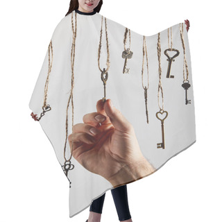 Personality  Cropped View Of Man Touching Vintage Keys Hanging On Ropes Isolated On White Hair Cutting Cape