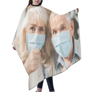 Personality  Emotional Elderly Couple In Medical Masks Showing Fist During Self Isolation Hair Cutting Cape