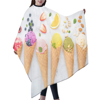 Personality  Various Of Ice Cream Flavor In Cones Blueberry ,pistachio ,almond ,orange And Cherry Setup On White Stone Background . Summer And Sweet Menu Concept. Hair Cutting Cape