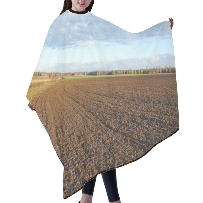 Personality  agricultural land after cultivation, autumn evening hair cutting cape