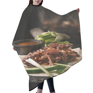Personality  Creatively Lit Succulent Classic Chinese Shredded Peking Duck With Hoisin Sauce And Flour Pancakes With Sliced Scallions And Cucumber Garnish. Copy Space. Hair Cutting Cape