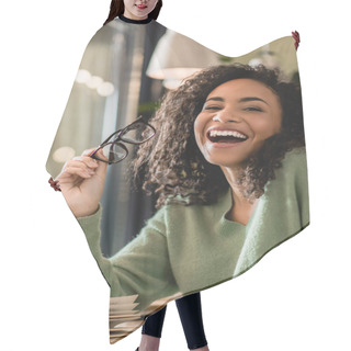 Personality  African American Woman Holding Eyeglasses And Laughing In Cafe Hair Cutting Cape