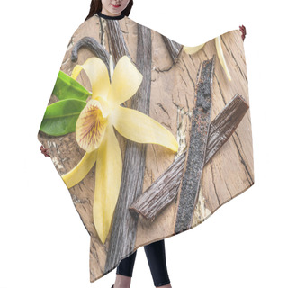 Personality  Dried Vanilla Fruits And Vanilla Orchid On Wooden Table. Hair Cutting Cape