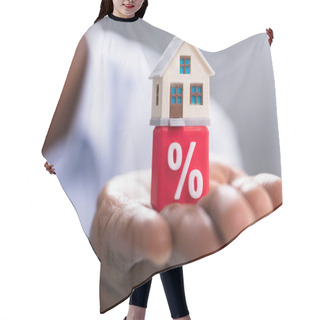 Personality  Close-up Of A Person's Hand Holding Miniature House On Red Percentage Block Hair Cutting Cape
