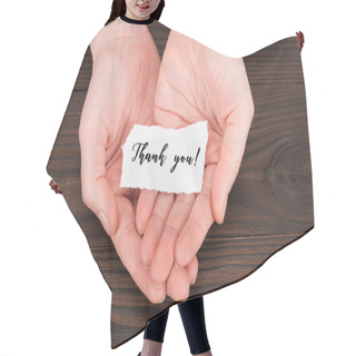 Personality  Cropped Shot Of Woman Holding Paper With Thank You Lettering Over Wooden Table Hair Cutting Cape