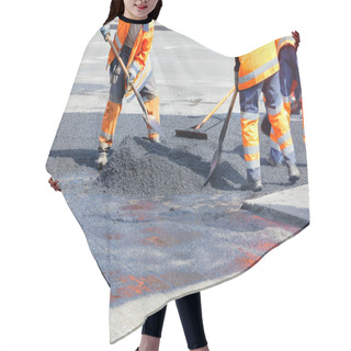 Personality  A Working Group Of Road Workers In Orange Overalls Renews A Section Of The Road With Fresh Hot Asphalt And Levels It With Shovels And Metal Slats. Hair Cutting Cape