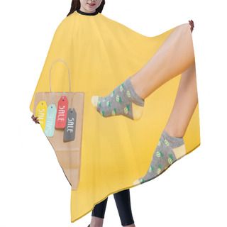 Personality  Cropped View Of Female Legs In Socks Near Paper Bag With Sale Tags Isolated On Yellow  Hair Cutting Cape