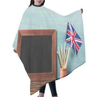 Personality  Empty Chalkboard Near Pencils And Uk Flag On Wooden Table Near Blue Wall Hair Cutting Cape
