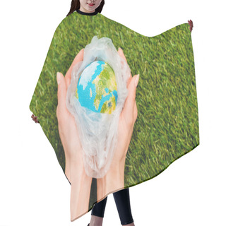 Personality  Cropped View Of Plastic Bag With Globe In Female Hands On Green, Global Warming Concept Hair Cutting Cape