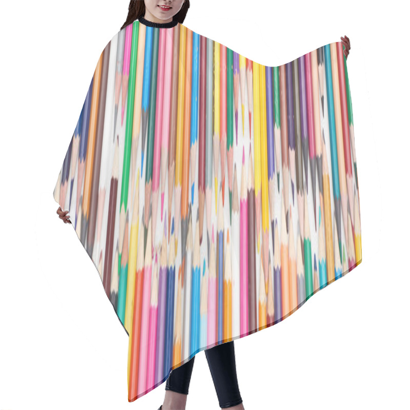 Personality  Panoramic shot of two lines of different sizes color pencils hair cutting cape