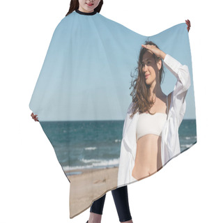 Personality  Positive Young Woman In White Shirt And Swimsuit Near Blue Sea On Sandy Beach Hair Cutting Cape