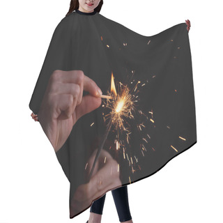 Personality  Female Hands Holding Bengal Light. Hair Cutting Cape