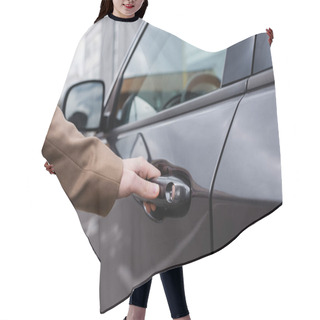 Personality  Cropped View Of Male Hand Reaching Door Of Black Shiny Car Hair Cutting Cape