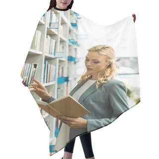 Personality  Beautiful Blonde Woman Reading Book While Standing In Library  Hair Cutting Cape