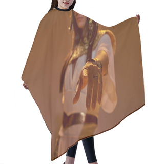 Personality  Cropped View Of Blurred Woman In Egyptian Attire Pointing With Finger At Camera On Brown Background Hair Cutting Cape