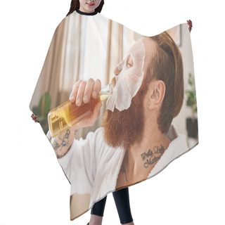 Personality  A Stylish Man With A Beard And White Robe Gracefully Sips From A Glass, Embodying Sophistication And Relaxation. Hair Cutting Cape