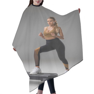 Personality  Sportive Young Woman Working Out On Step Aerobics Board On Grey Hair Cutting Cape