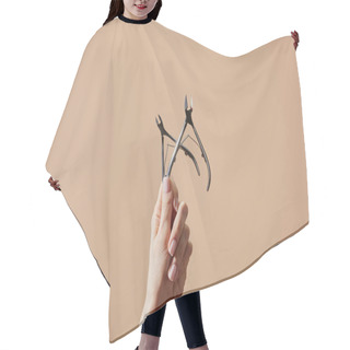 Personality  Partial View Of Female Hand With Cuticle Nippers Isolated On Beige Hair Cutting Cape