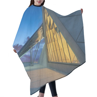 Personality  Contemporary Triangle Shape Design Modern Architecture Building Exterior With Glass, Concrete And Steel Element. Night Scene. Photorealistic 3D Rendering. Hair Cutting Cape