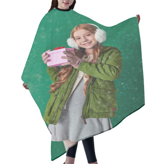 Personality  Preteen Girl In Ear Muffs, Scarf And Winter Attire Holding Christmas Present Under Falling Snow Hair Cutting Cape